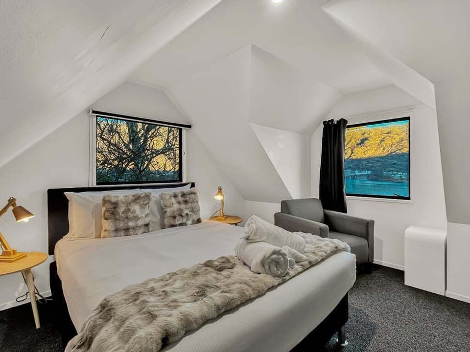 Spacious bedroom with lake views