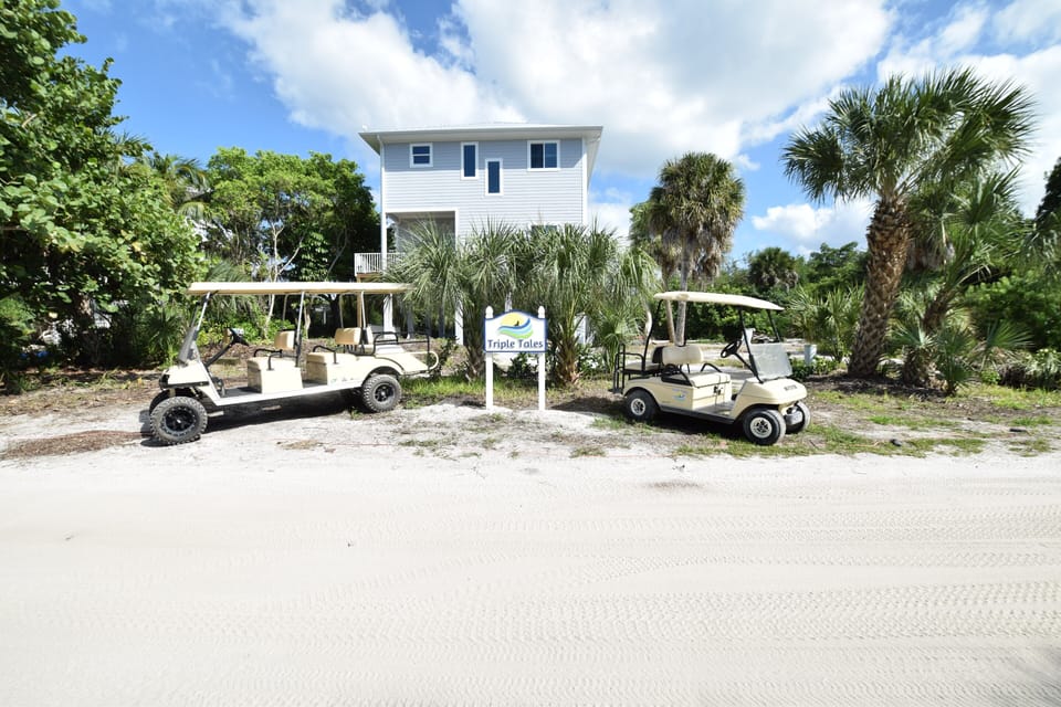 Front of property from the road, 2 golf carts included in rental