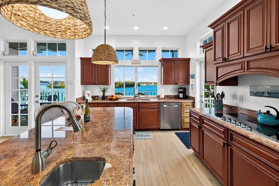 Sweeping water views can be enjoyed directly from the kitchen sink and main prep areas.