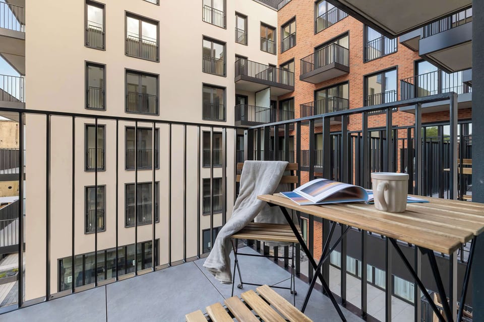 The balcony's peaceful ambiance is ideal for unwinding. 