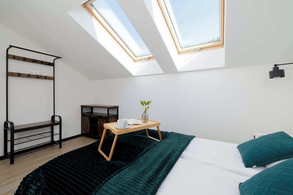 The bedroom features a luxurious double bed for a restful night's sleep. 