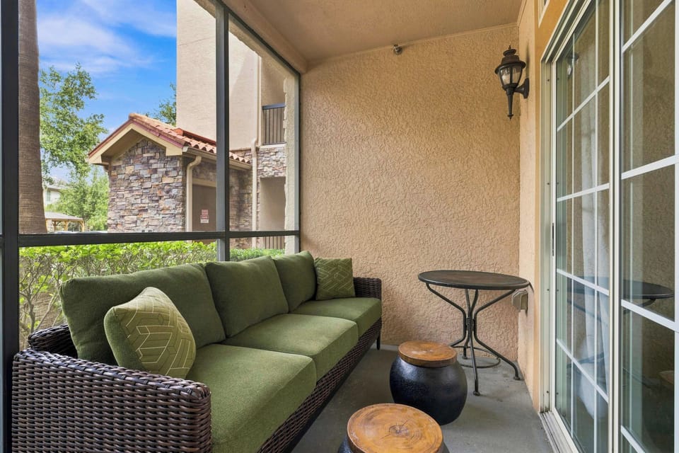Slide open the door to your private screened-in patio, where the child-inspired seating features a deluxe two-person hanging egg chair, a plush patio sofa, and rustic tables providing a quiet place to enjoy your morning coffee or unwind in the night