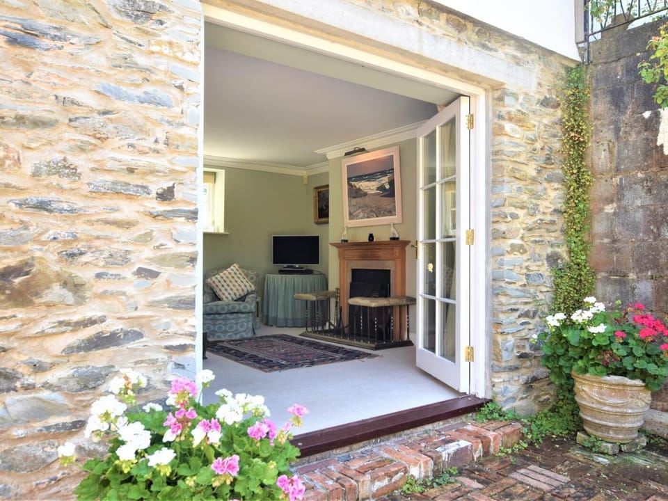 Door to the fantastic outside dining area and gardens