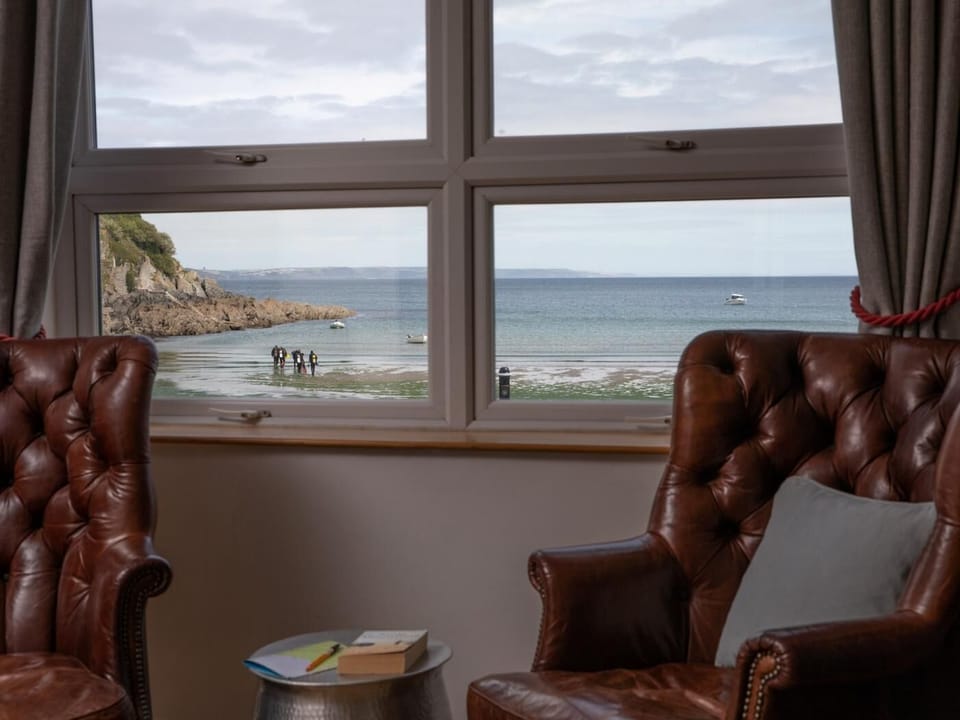 Enjoy a morning coffee while taking in the beach activities