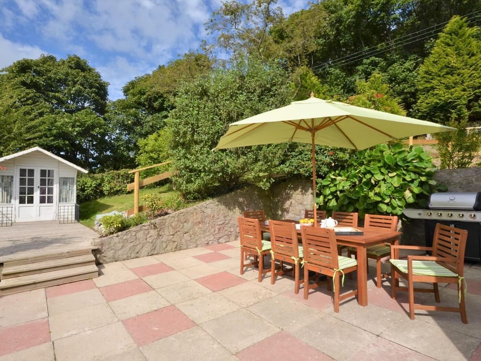 Spacious patio with BBQ and seating