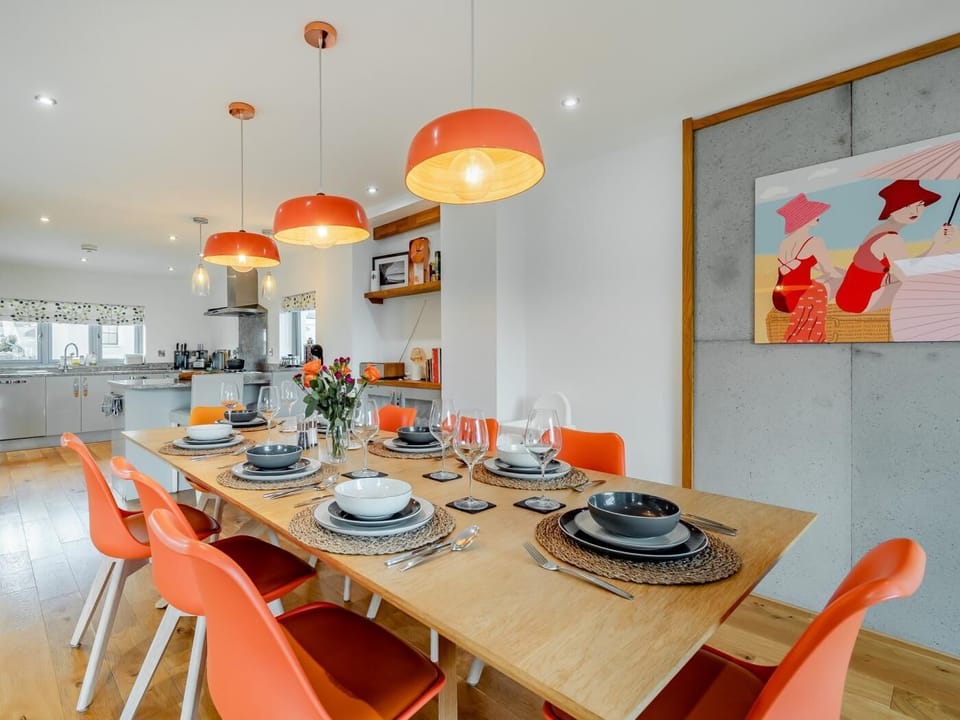 The kitchen leading onto the dining area giving a friendly ambience