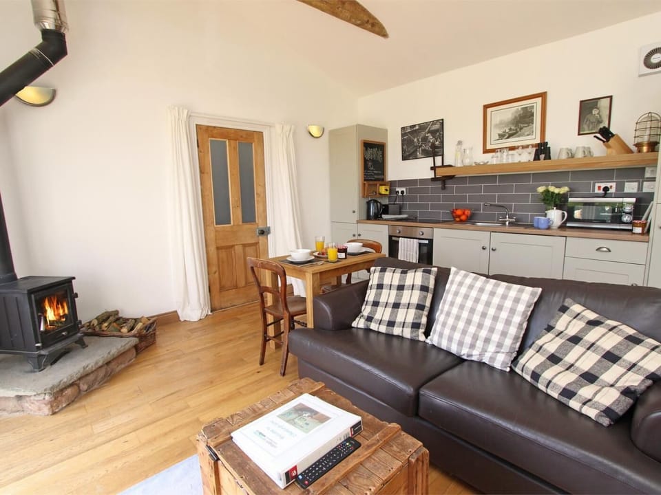 Relax in the studio style open plan lounge