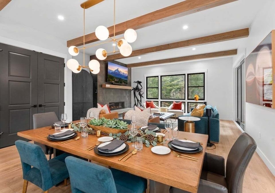 Dining Together - Gather around the spacious dining table for chef-prepared meals, holiday celebrations, or relaxed evenings after a day outdoors.