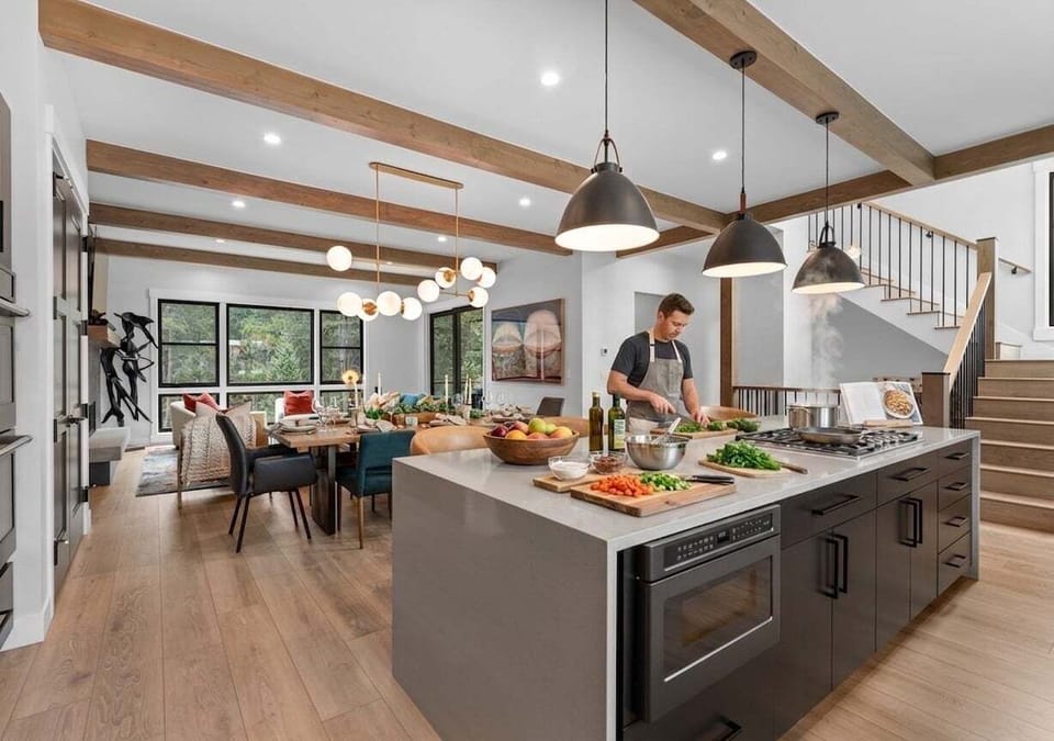Chef's Kitchen - Premium quartzite countertops, professional appliances, and an expansive entertaining space designed for memorable meals and gatherings.