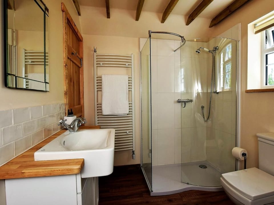 Large bathroom with a separate shower