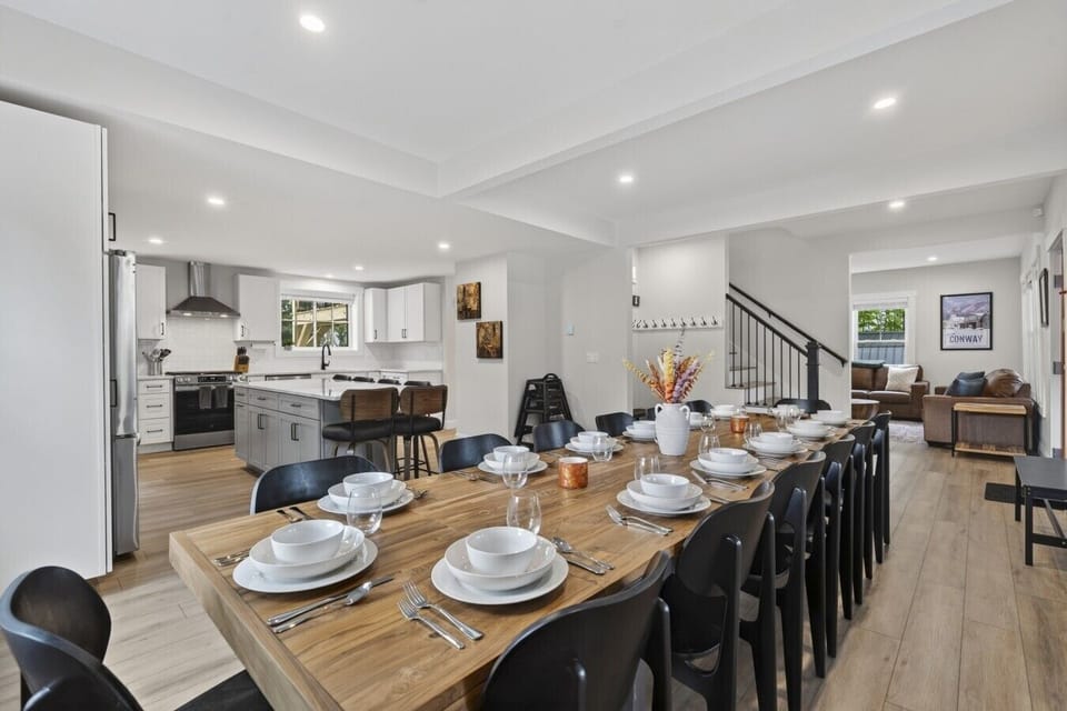 Big House: Kitchen Open-concept kitchen/dining room with brand new stainless steel appliances and a huge dining table and oversized quartzite island perfect for entertaining and those large group meals