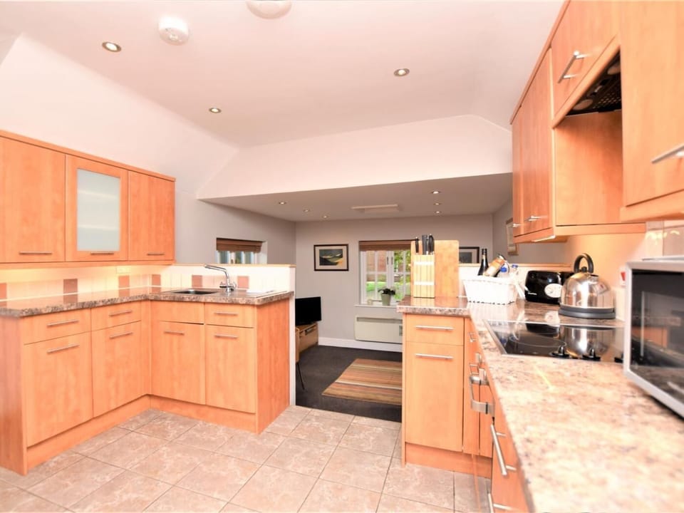 Kitchen area leading to the lounge/dining area