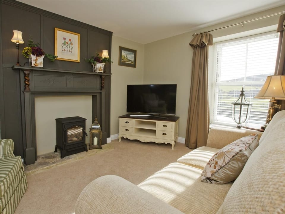 Sit down and relax in the living room and watch your favourite film