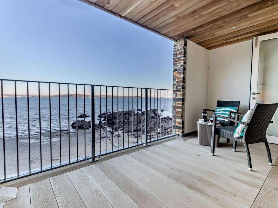 Spacious, private balcony overlooking the beach
