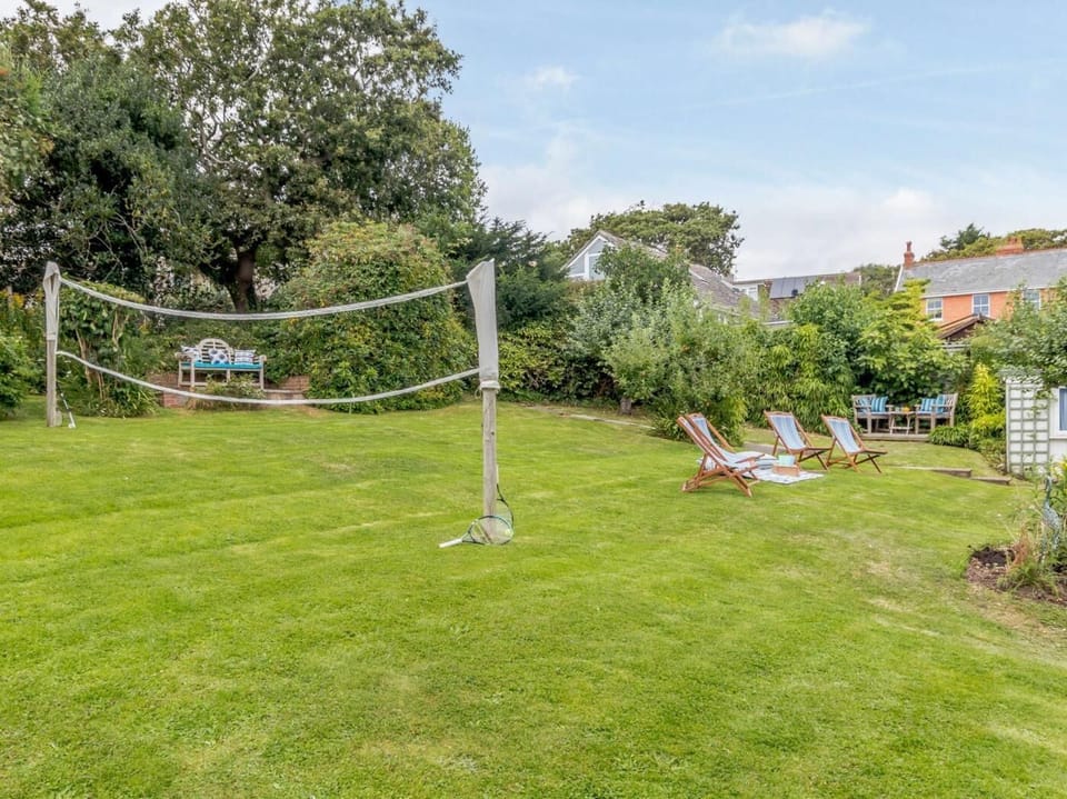 Challenge your companions to a game of badminton 