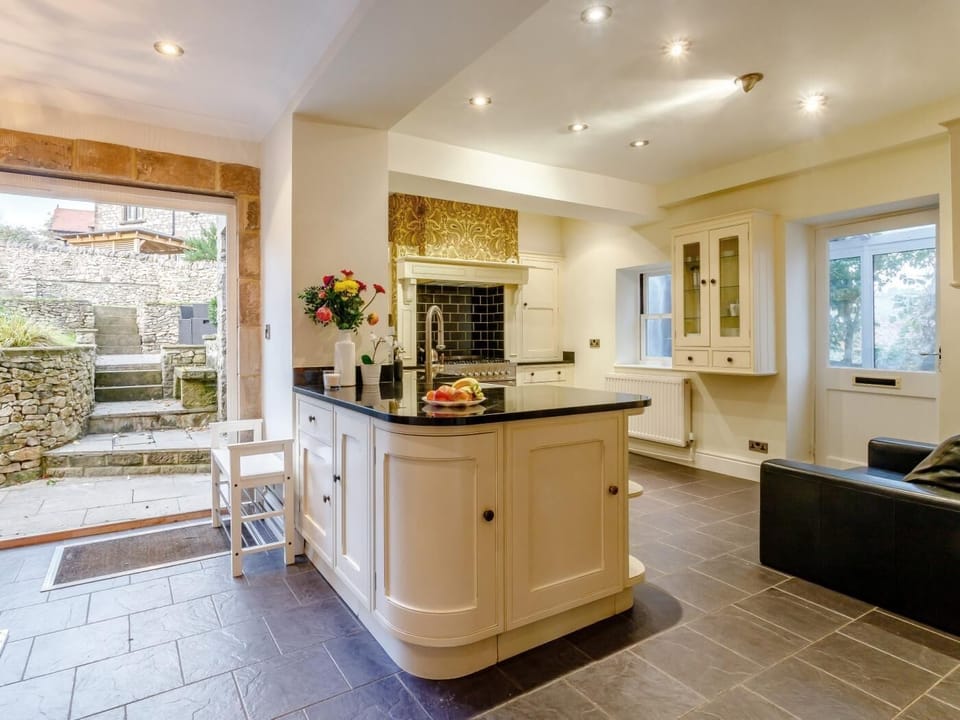 The traditional styled kitchen is equipped with modern conveniences