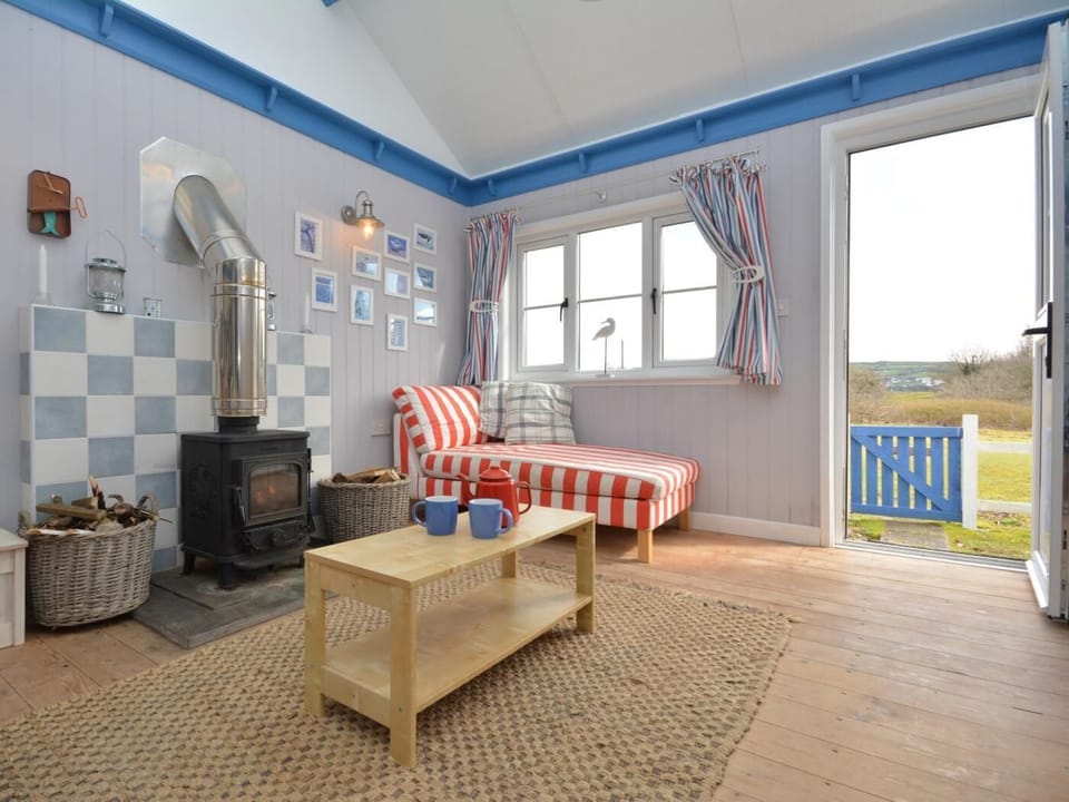 Open-plan accommodation with a warming wood burner