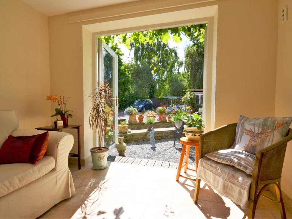 Open the French doors and head outside to the garden