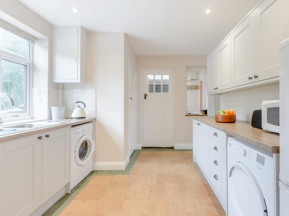 Delightful kitchen leading to the separate dining room