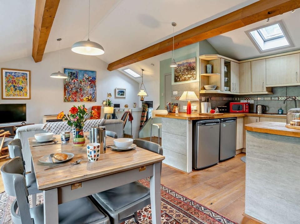 Bright and spacious open-plan living area with views over the river 