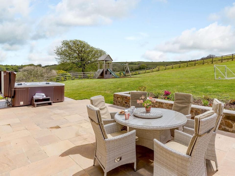 Soak in the hot tub or dine al fresco while taking in the views