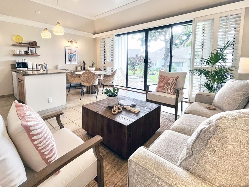 Experience the ultimate in island living with this bright, open-concept floor plan that flows from the kitchen to the sunlit living room. It's the perfect space for entertaining or relaxing while enjoying the constant, tropical cross-breeze