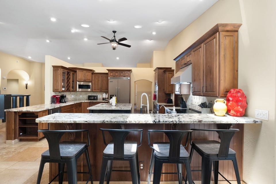 Open-concept kitchen with modern appliances.