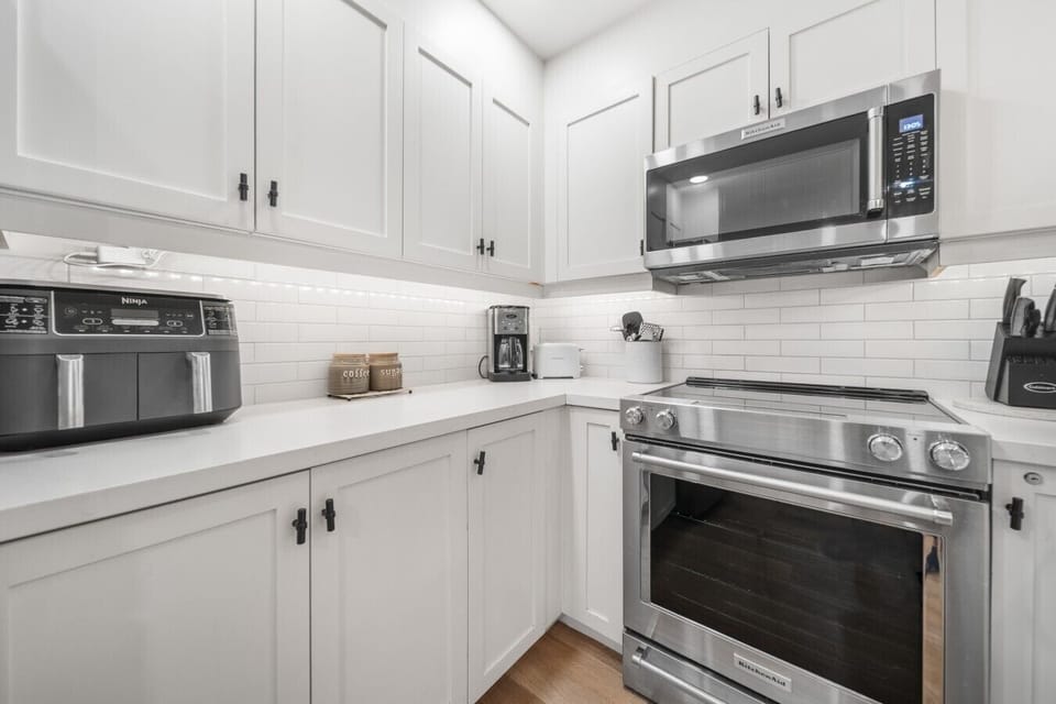 Well-equipped kitchen with premium appliances and ample counter space
