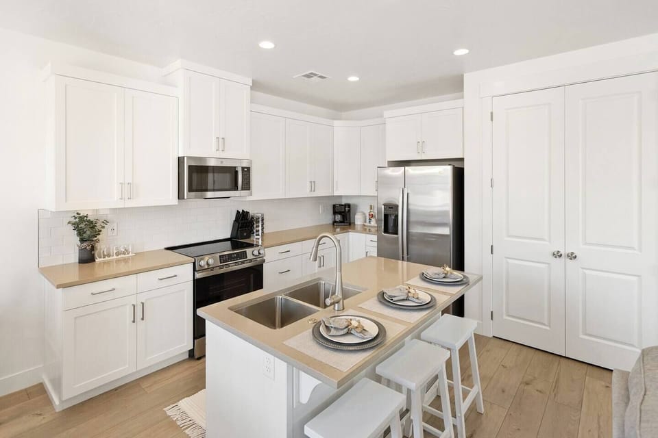 Kitchen island bar seating for 3 with room to prepare and enjoy meals together
