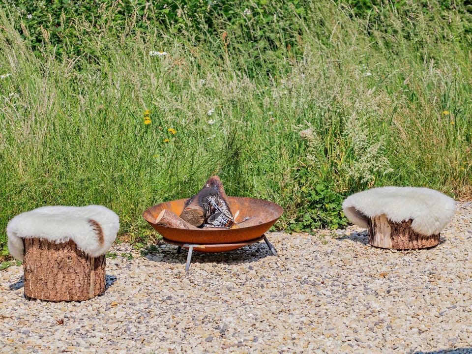 Light the fire pit and toast marshmallows or fire up the BBQ
