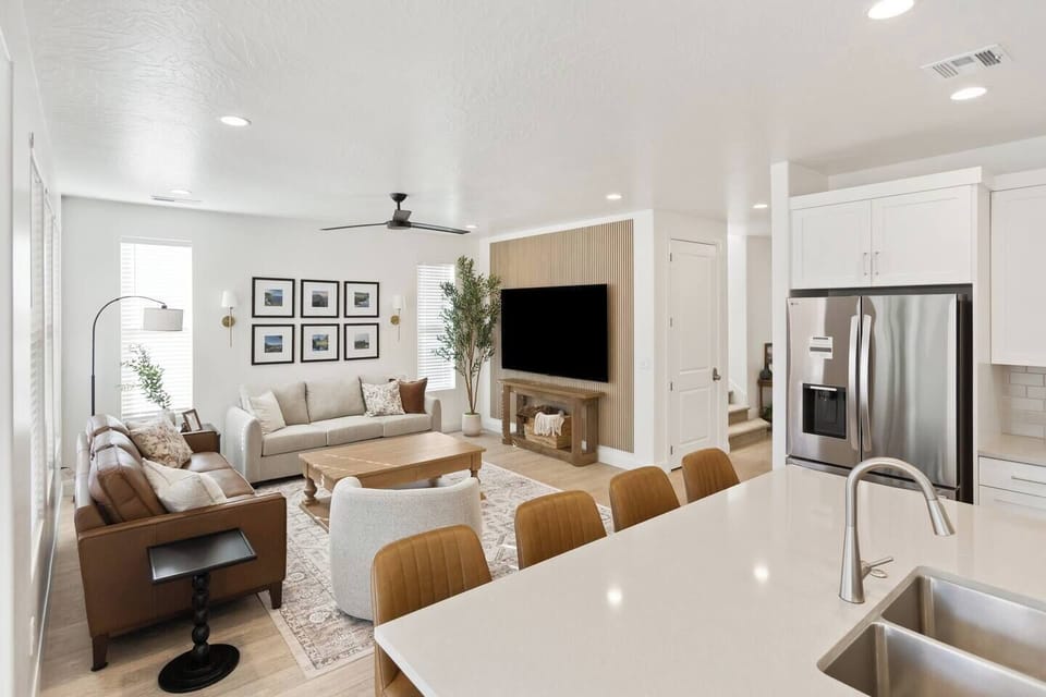 The open-concept living space allows the whole crew to stay connected for togetherness feel