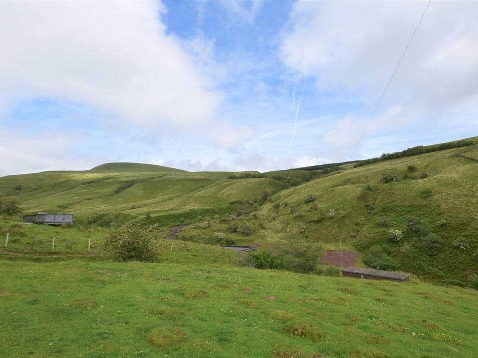 You are surrounded by rolling green hills