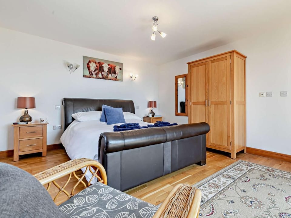 Ground floor master bedroom - with access to a sun room