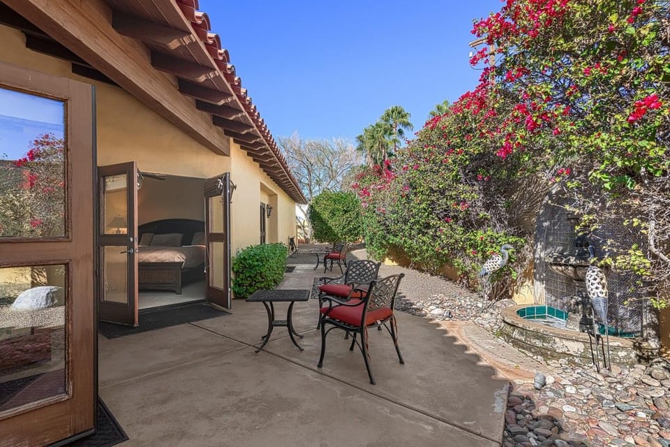 Furnished Patios Off of Guest Bedrooms with Fountain