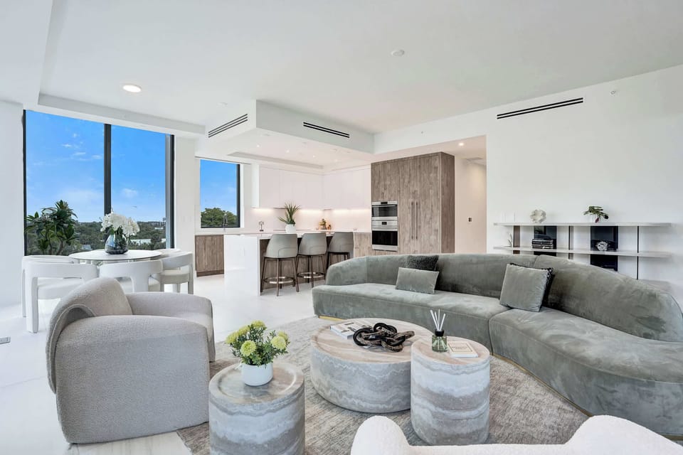 Open-plan living room flowing to kitchen
