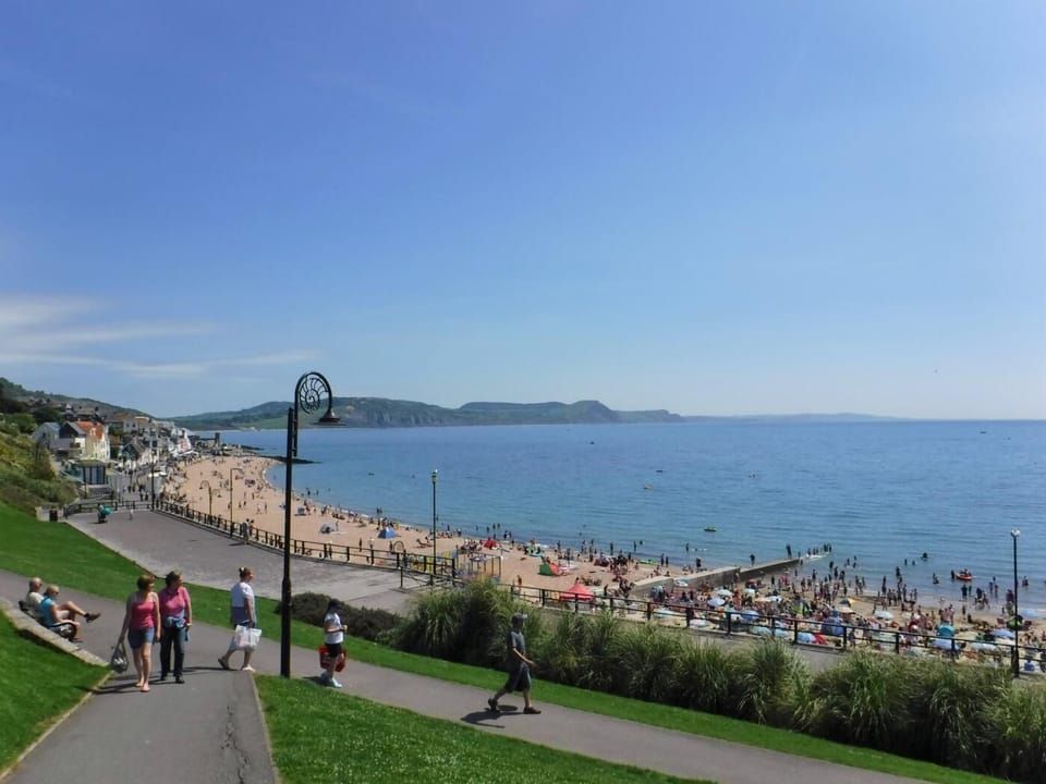 Stroll along the seafront promenade in nearby Lyme Regis