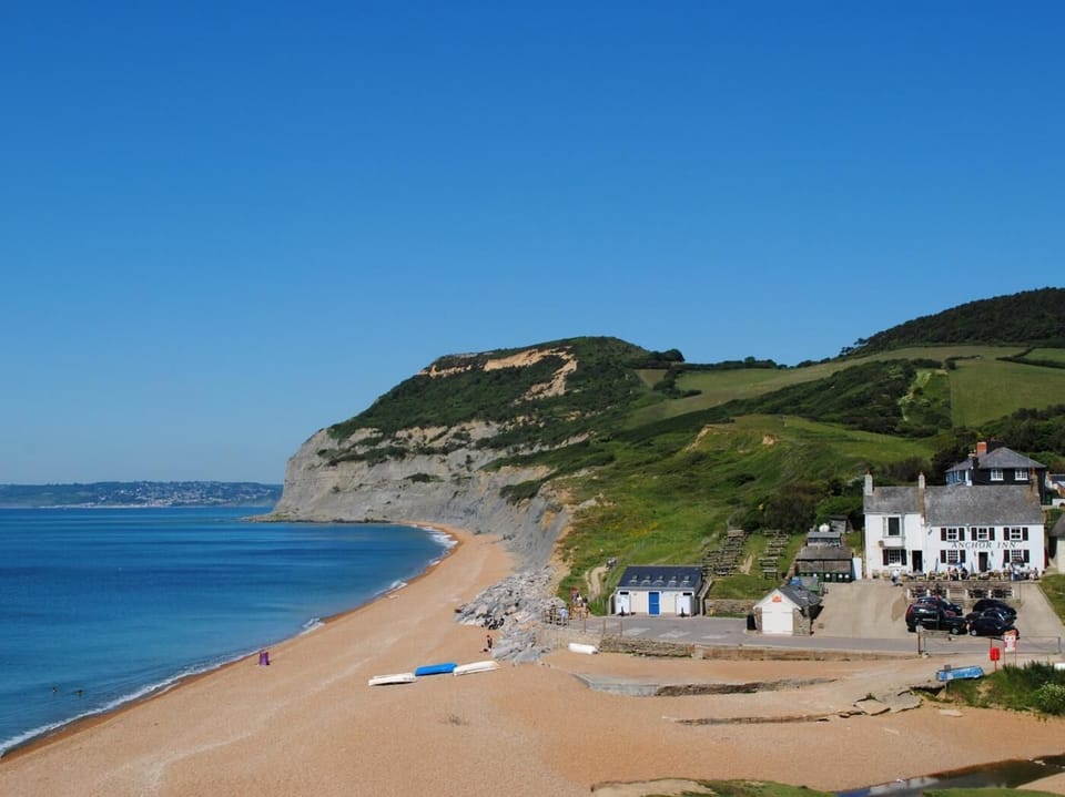 Walk down to Seatown beach and the excellently positioned Anchor Inn via the scenic bridleway 