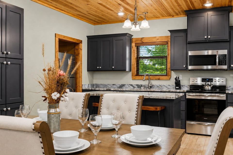 Spacious dining area with a large table and bar seating
