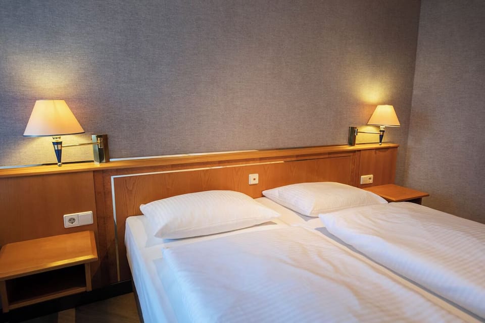 Sink into plush pillows and drift off in quiet comfort