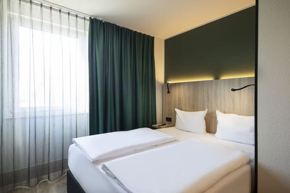 Wake gently to daylight filtering through soft, calming curtains.