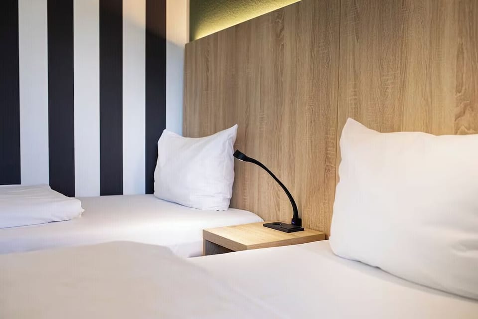 Settle in with cozy pillows and bedside lighting for reading.