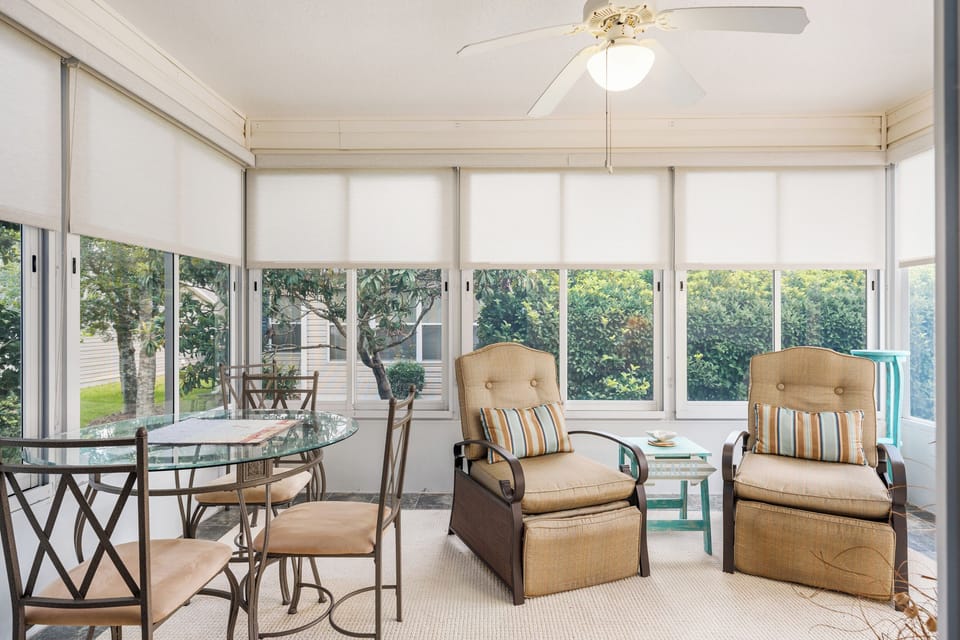 Screened-in/Glassed-in Lanai w/ Lounge Seating, Table & Chairs for 4x & Window AC Unit