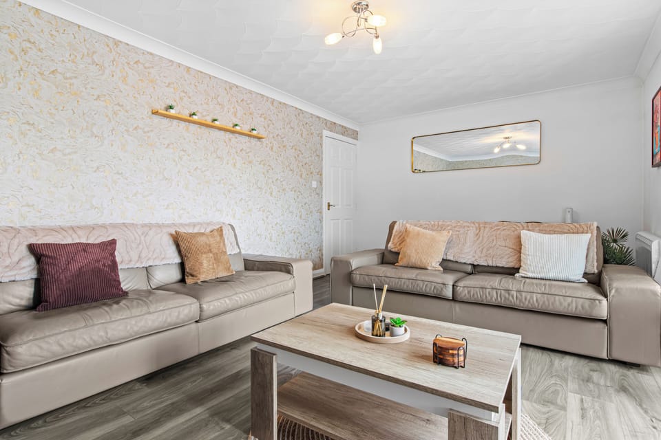 Bright, cozy lounge with two sofas and stylish modern touches