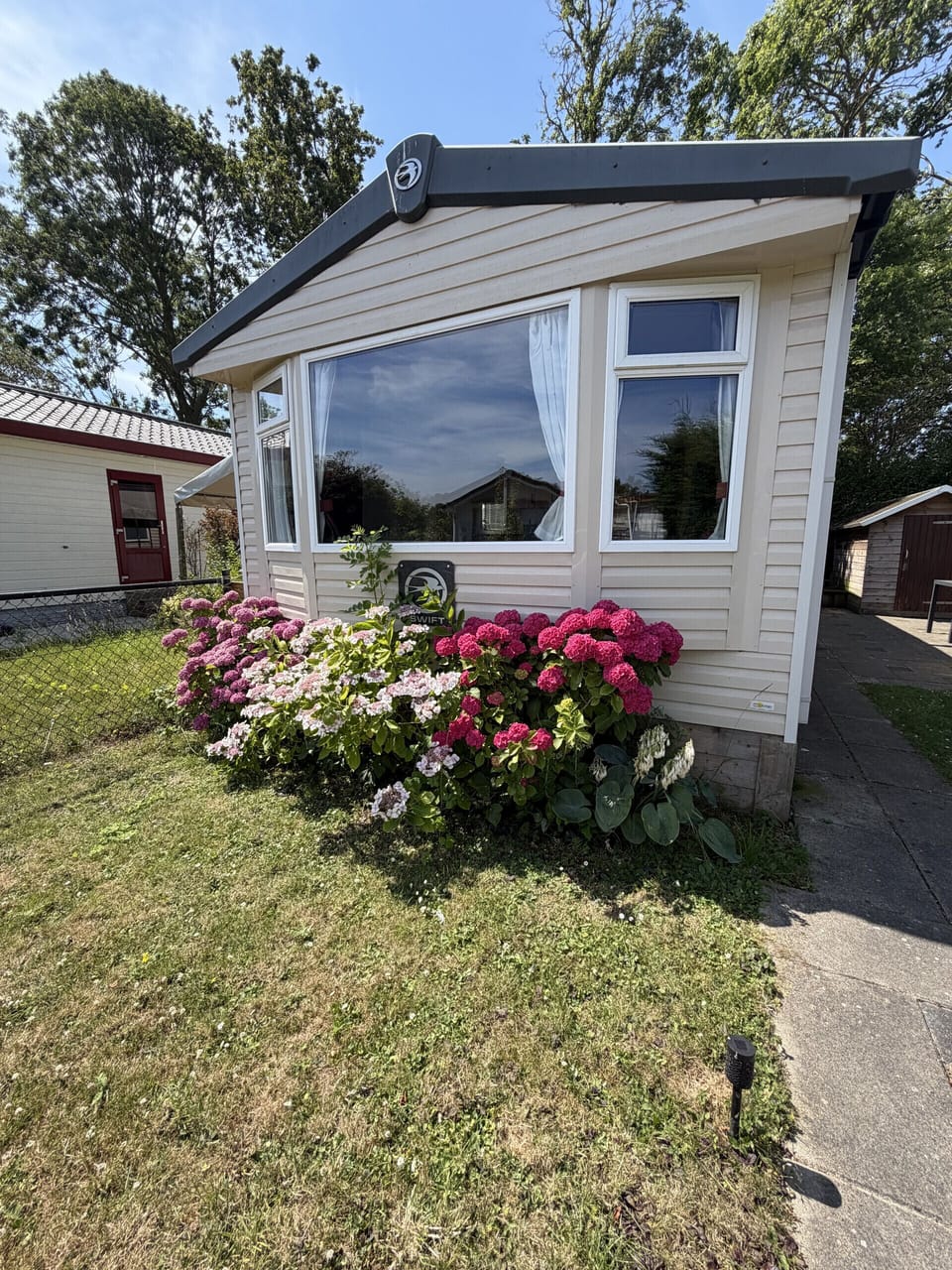 Front of the chalet with spacious garden