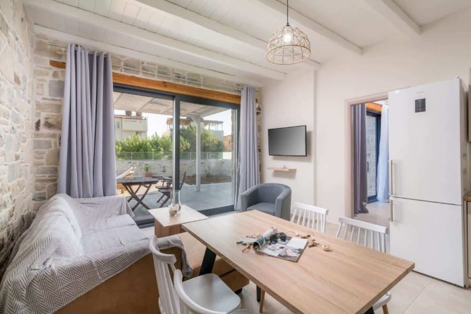 Cozy living area with direct access to the pool terrace