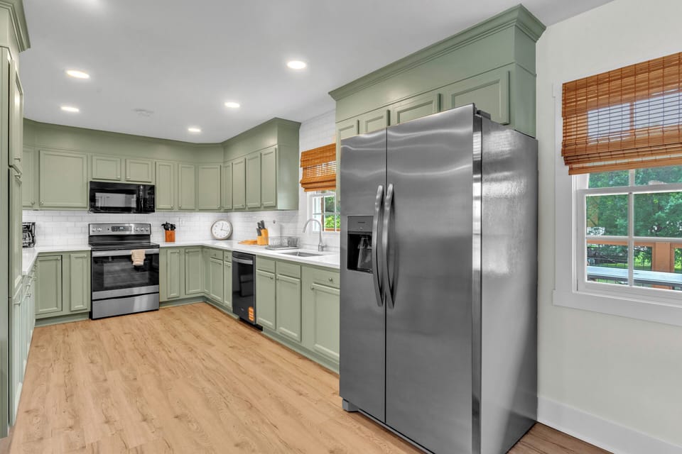 Bright kitchen with modern finishes and easy flow into the main living spaces.