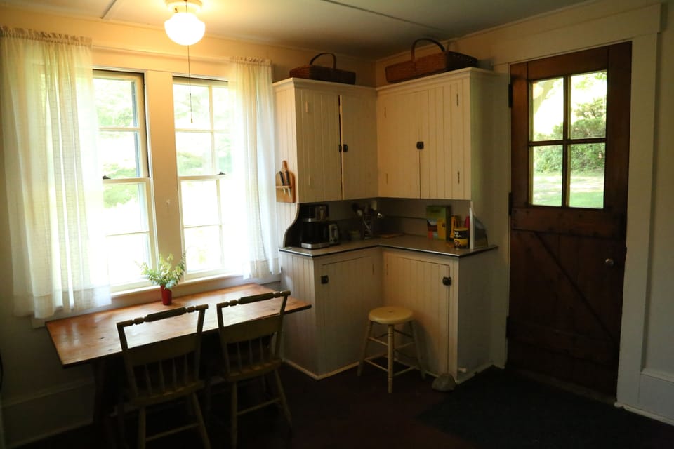 Step into your cozy cottage-style kitchen with natural light.