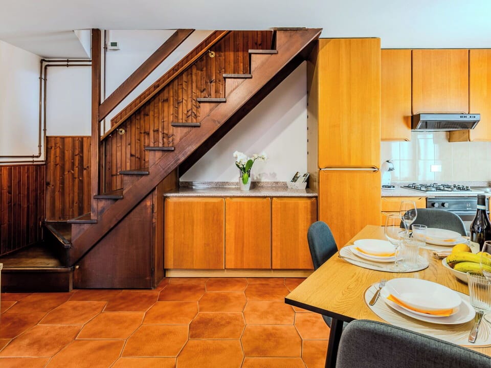 Kitchen, Flooring, Wood, Interior Design, Floor, Major Appliance, Countertop, Kitchen Appliance, Orange, Room