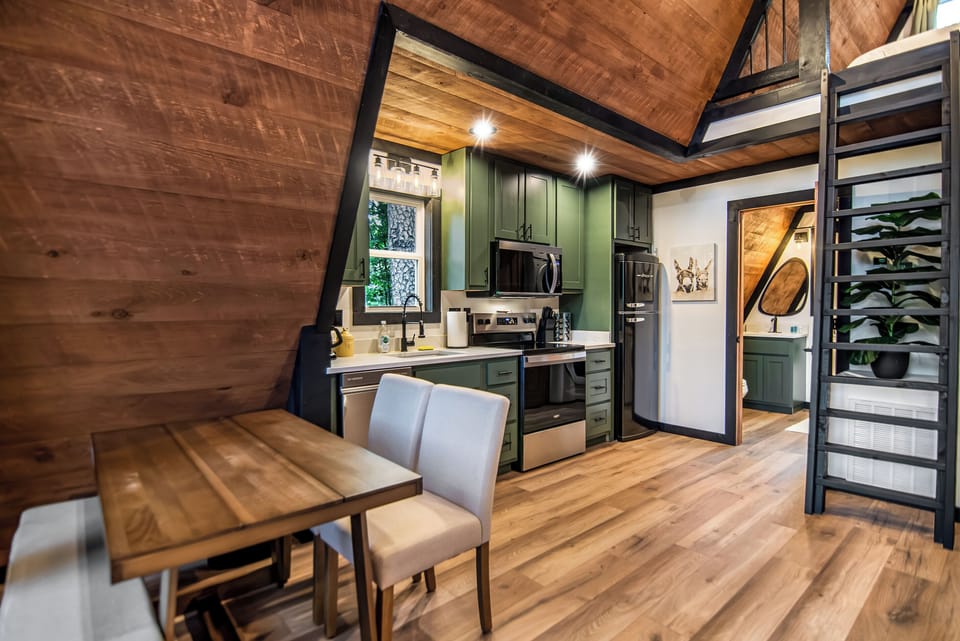 Full kitchen and dining seats for four.