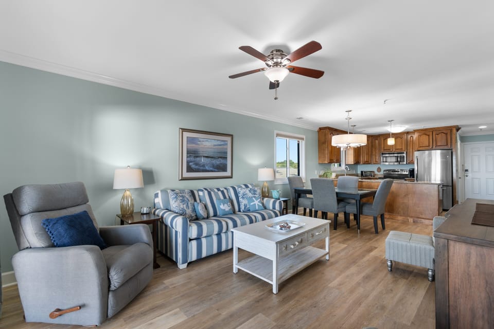 Living room with recliner, coastal sofa, and hardwood-style flooring, Surfwatch 3 Unit 305, Surfside Beach